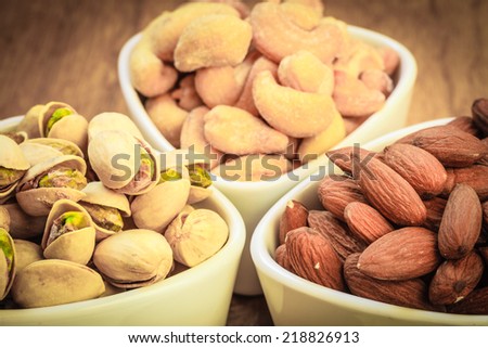Healthy food and cuisine. Varieties of nuts: cashew, pistachio, almond