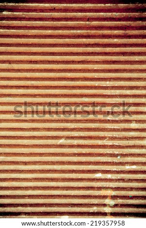 Architectural detail. Closeup of beige striped wooden surface as background texture or pattern.