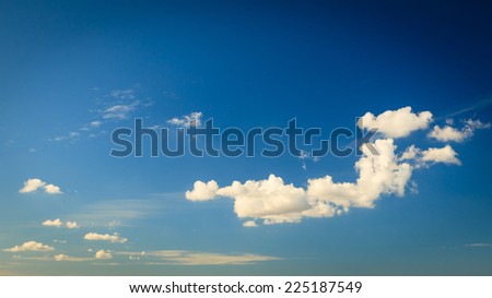 Deep blue sky background with white clouds.  Natural composition of nature.
