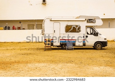 Similar – Image, Stock Photo A old camper with a fancy curtain