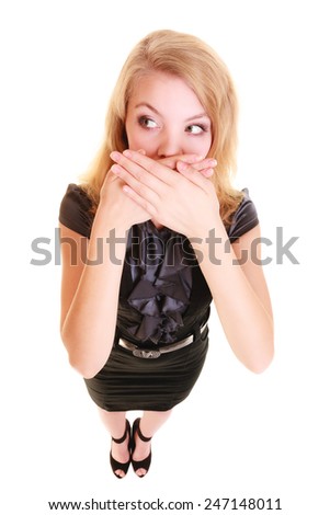 surprised woman shocked buisnesswoman in black dress covers mouth with hand isolated on white