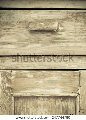 Furniture part. Retro style. Closeup of vintage wooden kitchen cabinet or cupboard as background.