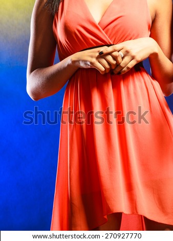 Party, new year, celebration, disco concept. Woman part body in evening dress in club.