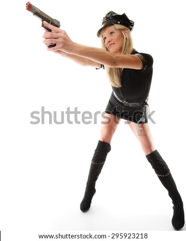 Full length blonde female policewoman cop posing with gun handgun isolated on white background