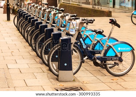 LONDON, ENGLAND UK - SEPTEMBER 20, 2014: Bikes for rent docking station. Barclays Cycle Hire on September 20, 2014, England. Barclays Cycle Hire BCH is public bicycle sharing scheme in London