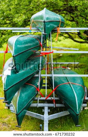 Similar – Image, Stock Photo Many canoes ready to go out