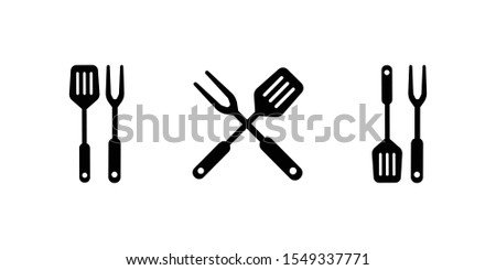 BBQ or grill tools icon. Crossed barbecue fork with spatula. Black simple silhouette. Symbol Template Logo. Vector illustration flat design. Isolated on white background