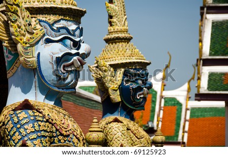Detail of demon guard statues at the Grand Palace and \