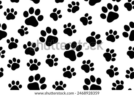 Elegant Seamless Black and White Dog Paw Print Pattern for Graphic Design and Textile Art