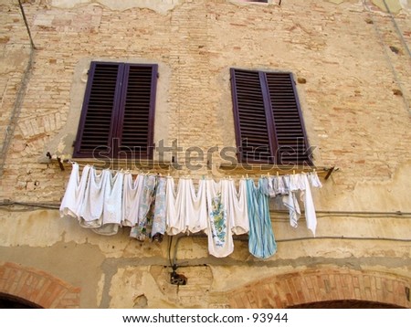 Clothes hanging from window in Italy