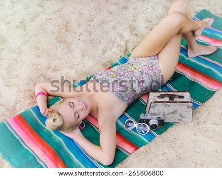 sensual happy cute hot body young woman lying on the beach with colorful details, relax concept, travel