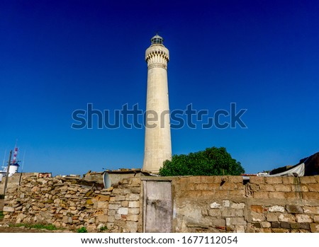 El Hank Lighthouse constructed in 1916, 50 m tall, abandoned facility.  - Casablanca, Morocco, taken in Dec 2019. Photo stock © 
