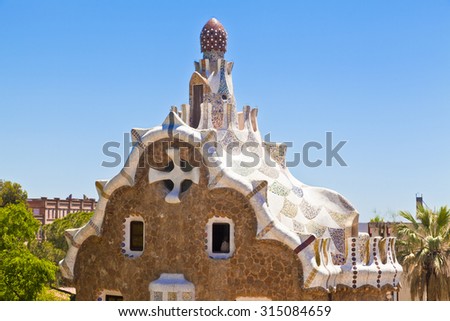 BARCELONA, SPAIN - MAY 22, 2015 Ceramic mosaic Park Guell - the famous architectural town art designed by Antoni Gaudi and built in the years 1900 to 1914