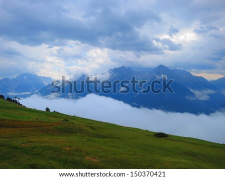Above the clouds in the Engadine valley, Switzerland