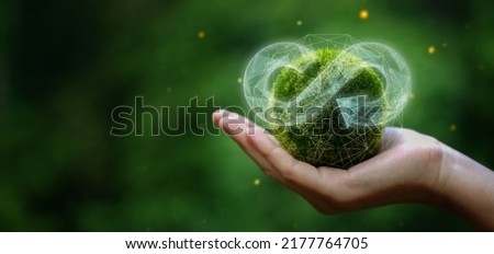 businessman holding circular economy icon Circular economy concept for future business growth and environmental sustainability and reduce pollution for future business and environmental growth. 商業照片 © 