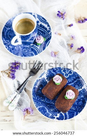 Chocolate cake Potato on a blue plate