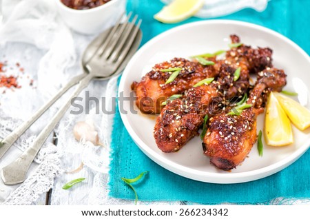 Sweet and Sticky Chicken Drumsticks on white background