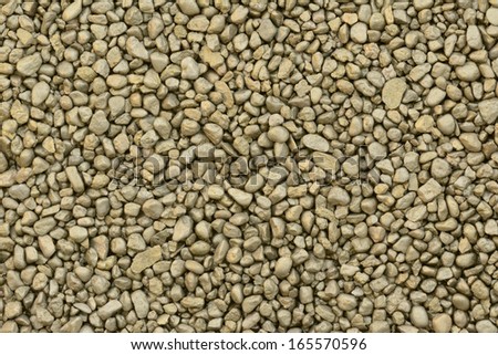 Golden sprayed small natural gravels background