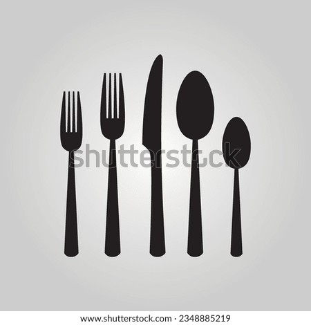 Black silhouette cutlery set including spoon, fork, and knife icons set on gray gradient background