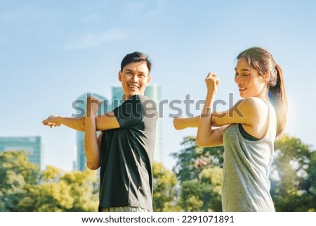 Similar – Foto Bild Fröhliche Sportlerin beim Aufwärmen während des Trainings