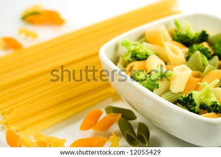 Italian noodles in bowl and spaghetti