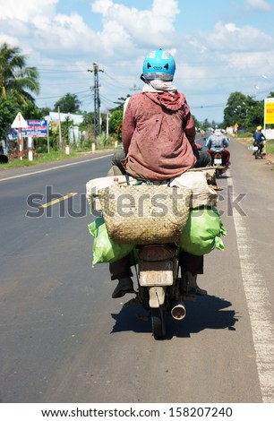 VIET NAM- SEPTEMBER 2: Unsafe transportation on road by motorbike at Viet Nam, September 2, 2013