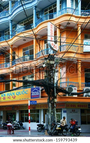 HO CHI MINH CITY, VIET NAM- OCTOBER 24: Colorful house of city and electric wire network in Sai Gon, VietNam, October 24, 2013