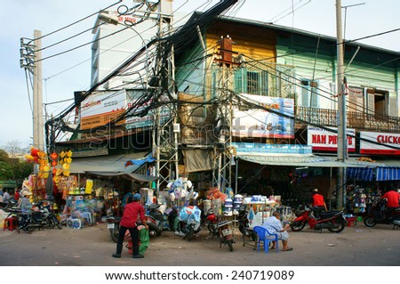 HO CHI MINH CITY, VIET NAM- DEC28: Amazing chemical store at Kim Bien market, electric pole in shop with wiring network, risk of burn, explode at residential, unsafe, danger life, Vietnam, Dec28, 2014