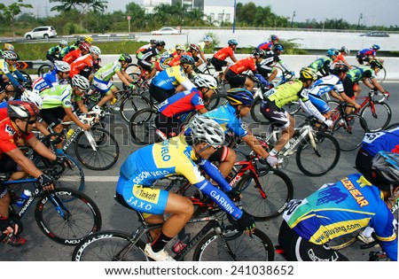 HO CHI MINH CITY, VIET NAM- JAN2: Amazing cycle race, sport activity to happy new year at Asia, rider wear helmet, ride bicycle in high speed, spirit, Vietnamese rider in action, Vietnam, Jan 2, 2014