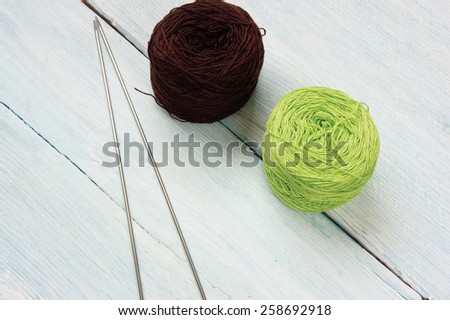 Knit with ball of wool, handmade present for lover with heart, material are colorful wool, needle with clever of hand can make meaningful gift and pleasure life