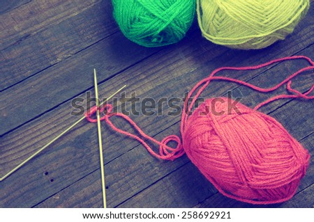 Knit with ball of wool, handmade present for lover with heart, material are colorful wool, needle with clever of hand can make meaningful gift and pleasure life