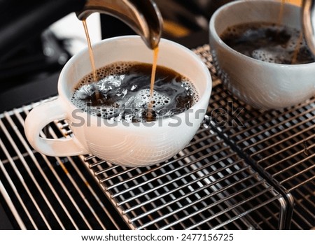 Similar – Foto Bild Nahaufnahme einer Tasse Kaffee mit Milch von oben gesehen