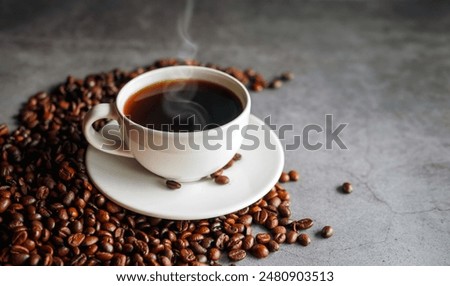 Similar – Foto Bild Eine Tasse schwarzer Kaffee mit einer weiblichen Hand auf einem leuchtend orangefarbenen Hintergrund. Minimalismus, Draufsicht. copyspace