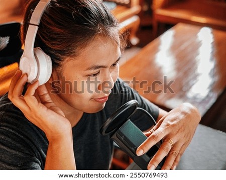 Similar – Image, Stock Photo Positive female radio host in studio