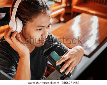 Similar – Image, Stock Photo Positive female radio host in studio