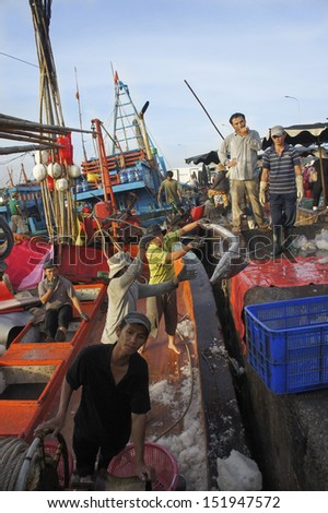 Lagi, Binh Thuan/Viet Nam - July 22, 2012: Fishermen are working on port on July 22,2012 in Lagi port, Binh Thuan - Viet Nam,Located in Lagi Town, 68 km to the south of Phan Thiet city