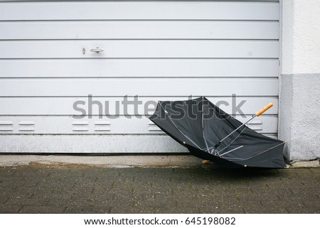 Similar – Image, Stock Photo Stretched lying umbrella with raindrops. Black and white photo