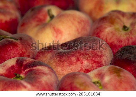 background of red juicy peaches for design