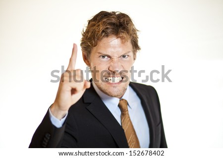 Angry businessman telling someone off