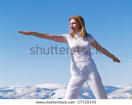 woman does exercises in cool air