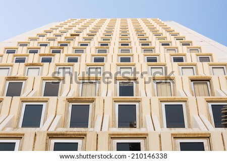 unusual perspective tall  building on a background of blue sky