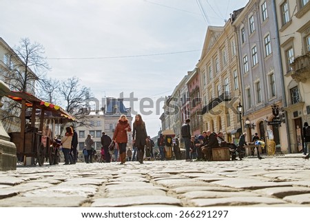 Lviv , Ukraine - March 21, 2015 :  Old Town . People walking in the area . Lviv is the largest city in western Ukraine .
