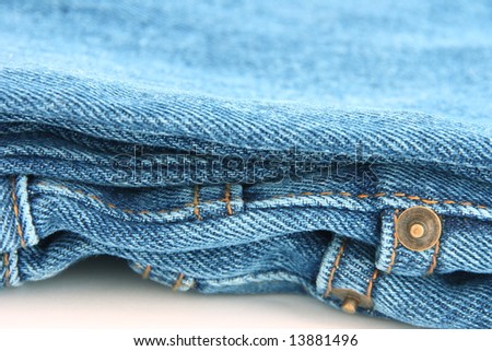 Close up folded blue jeans