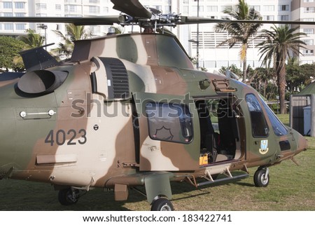 DURBAN, SOUTH AFRICA - MARCH 22, 2014: South African Military helicopter lands on beach front in Durban South Africa.