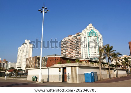 DURBAN, SOUTH AFRICA - JULY 2, 2014: Rachael Findlayson Pool in front of commercial and residential complexes on Golden Mile Beach front in Durban, South Africa