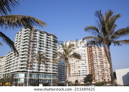 DURBAN, SOUTH AFRICA - JULY 23, 2014: View of palm trees in front of golden mile beachfront hotels in Durban South Africa