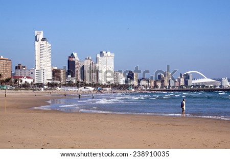DURBAN, SOUTH AFRICA - DECEMBER 18, 2014: Many unknown people on South Beach against \