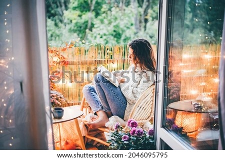 Similar – Image, Stock Photo balcony Reading Literature