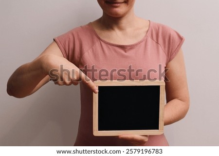 Similar – Image, Stock Photo Cheerful black showing frame gesture on city street