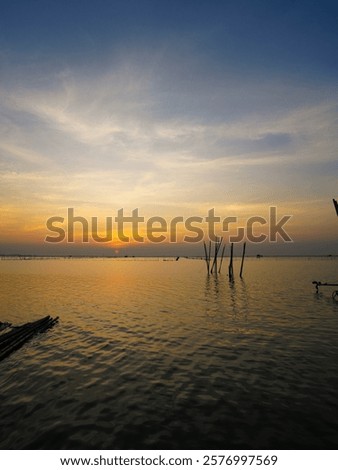 Similar – Image, Stock Photo Bright river landscape under cloudy sky with houses and buildings o city